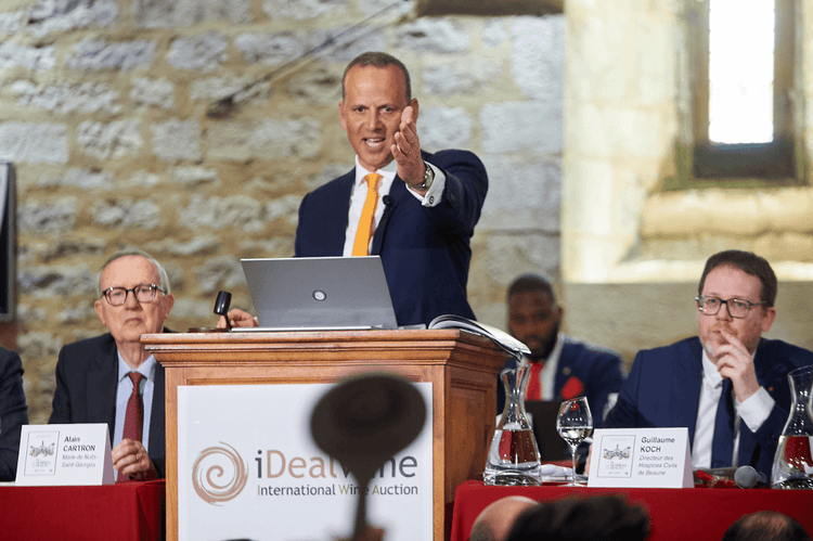 iDealwine organises Hospice de Nuits auction with Cyrille Jomand awarding a bid to someone
