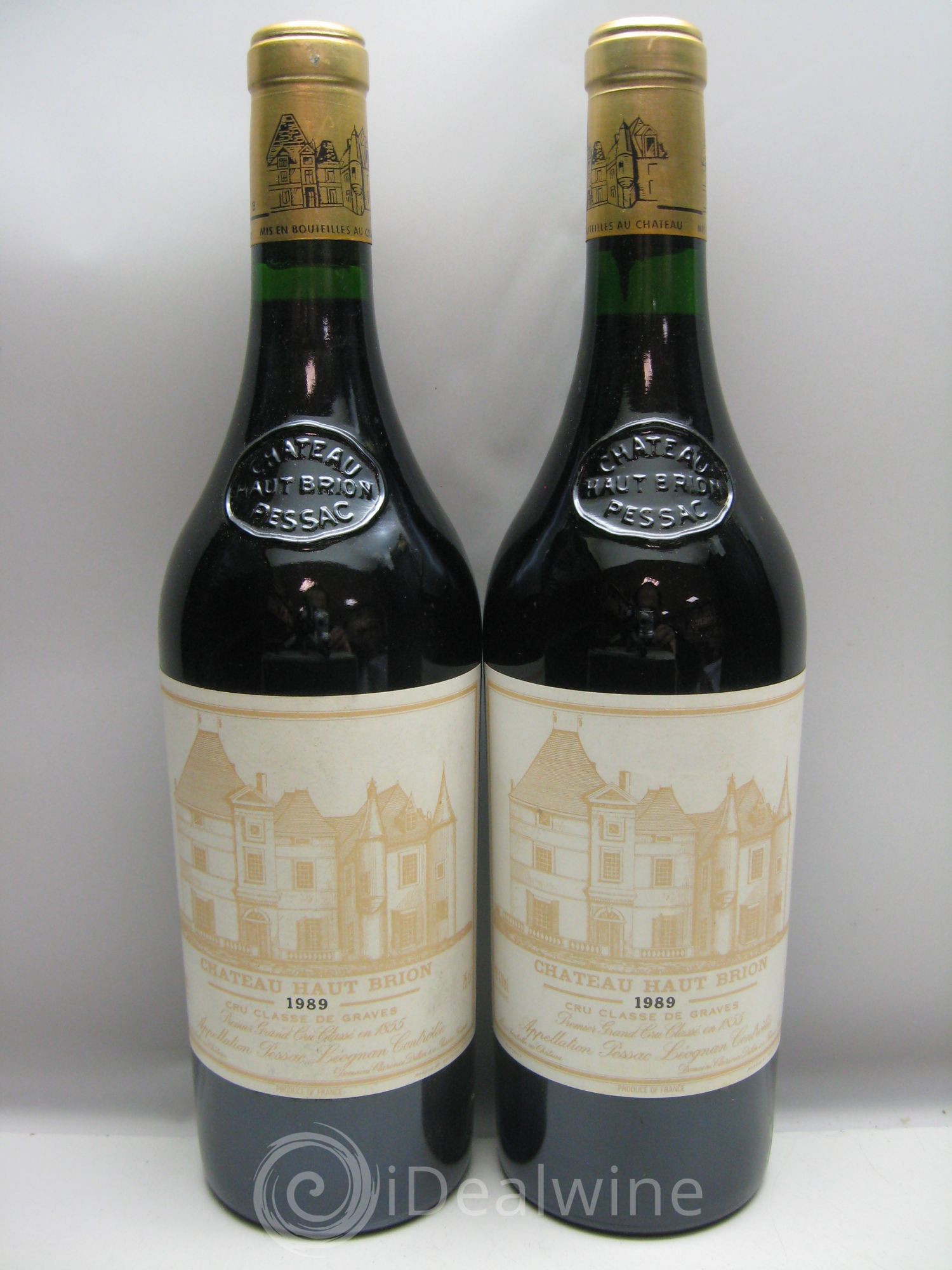 Château Haut Brion 1er Grand Cru Classé Caisse bois très abimée et humide -  1989 - Lotto di 12 bottiglie - 2
