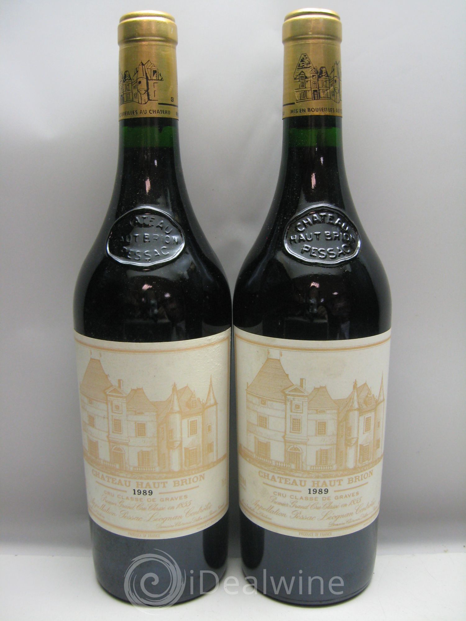 Château Haut Brion 1er Grand Cru Classé Caisse bois très abimée et humide -  1989 - Lotto di 12 bottiglie - 4