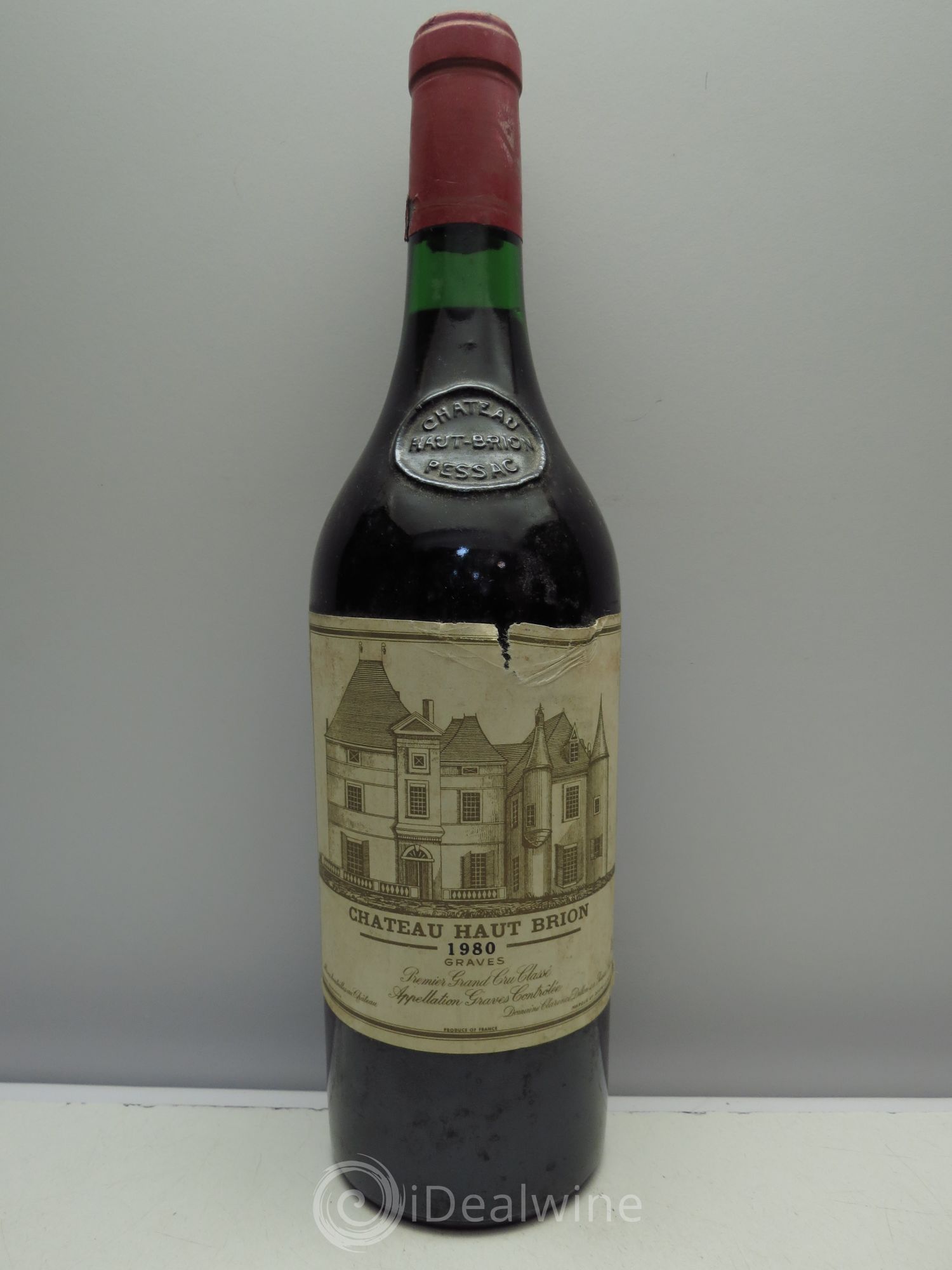 Château Haut Brion 1er Grand Cru Classé caps neutre 1980 - Lot de 1 bouteille - 0